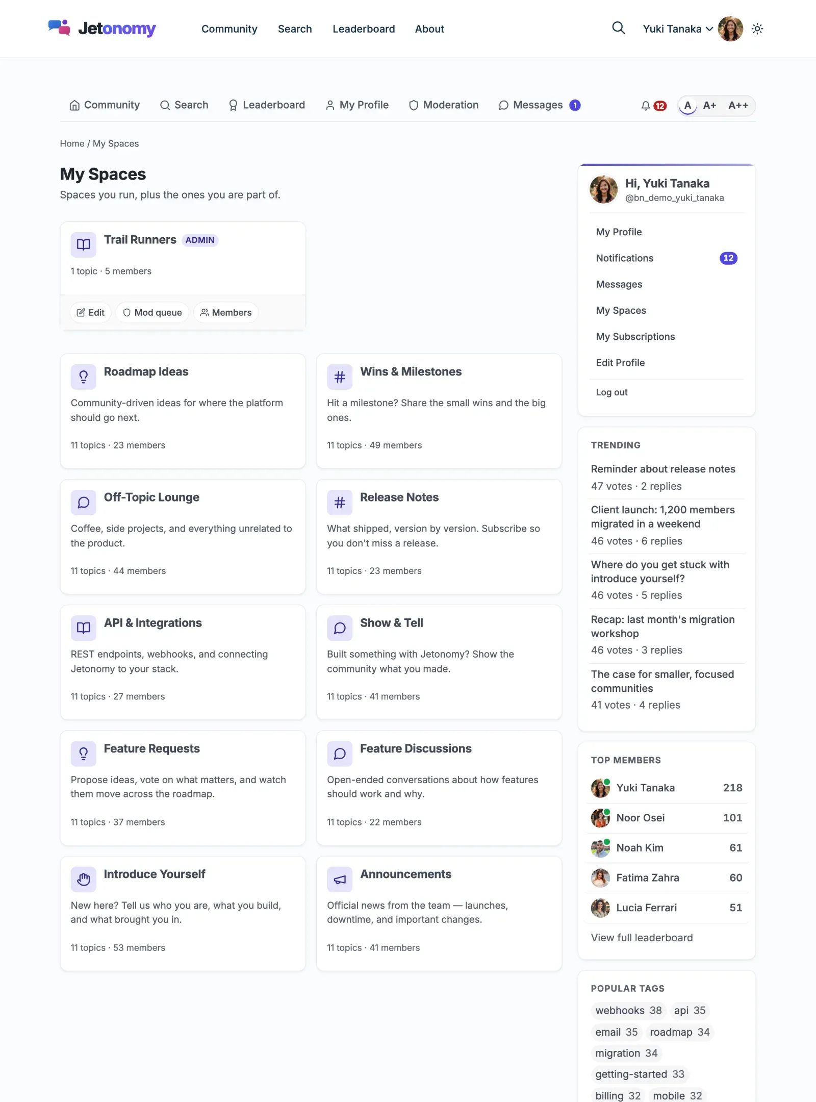 My Spaces page showing the “Spaces you run” section with Admin and Mod role badges and Edit, Mod queue, and Members quick-action buttons, above the “Spaces you’re in” section